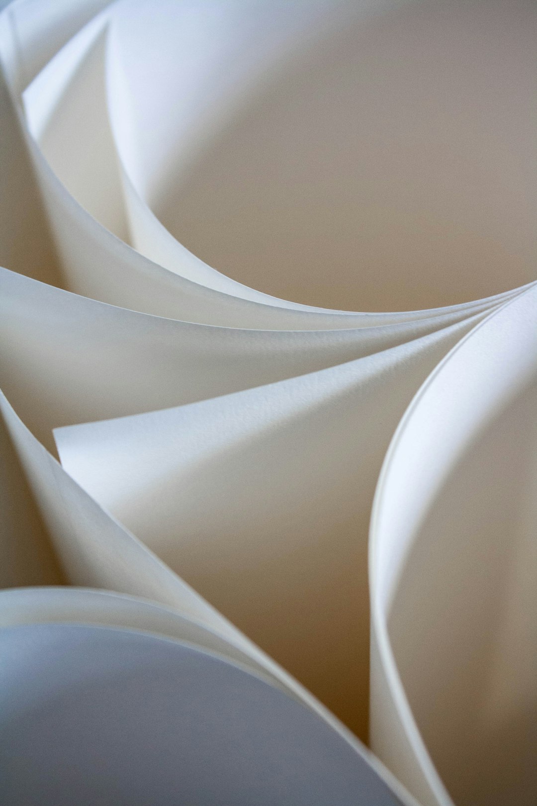 a-close-up-of-a-bunch-of-white-paper-s5eh2zeq13y