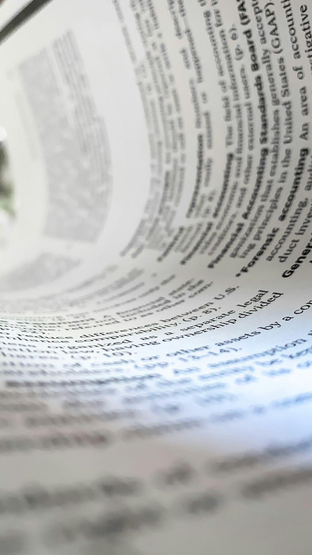 a-close-up-of-a-book-with-a-pen-on-top-of-it-yykibjyrj-u